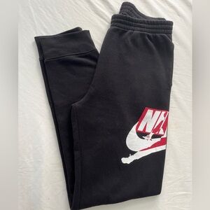 Boy’s Nike Black Sweatpants with Red and White Graphic